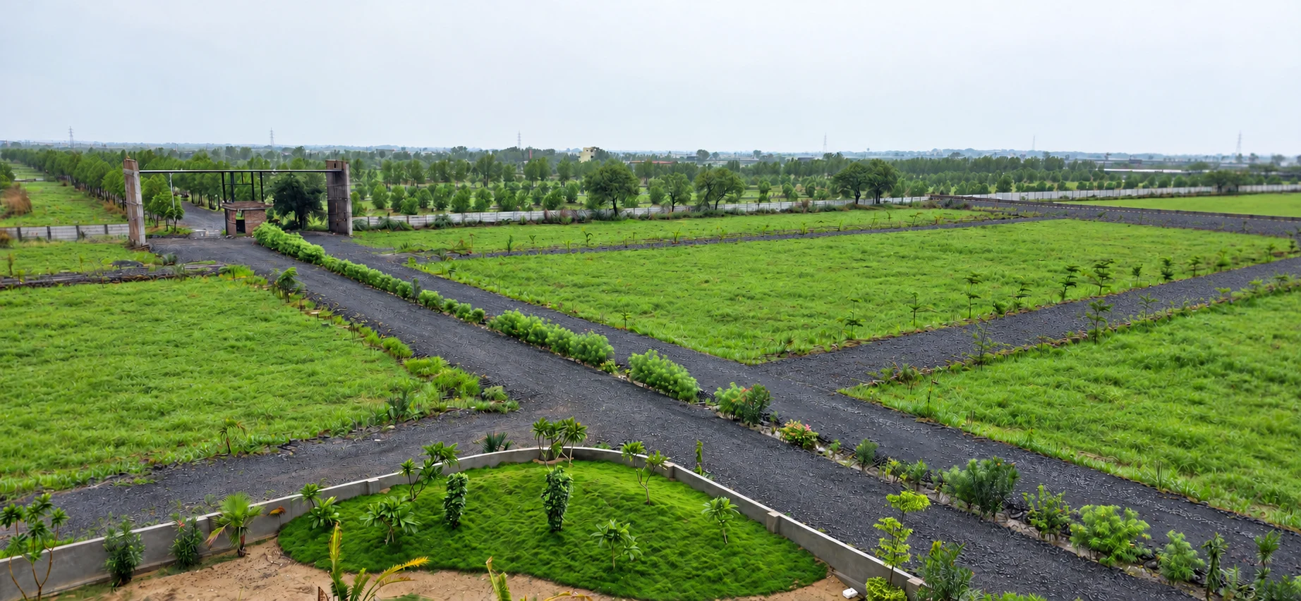A wide view across Lakeside Meadows grounds, entrance and intersecting internal roads